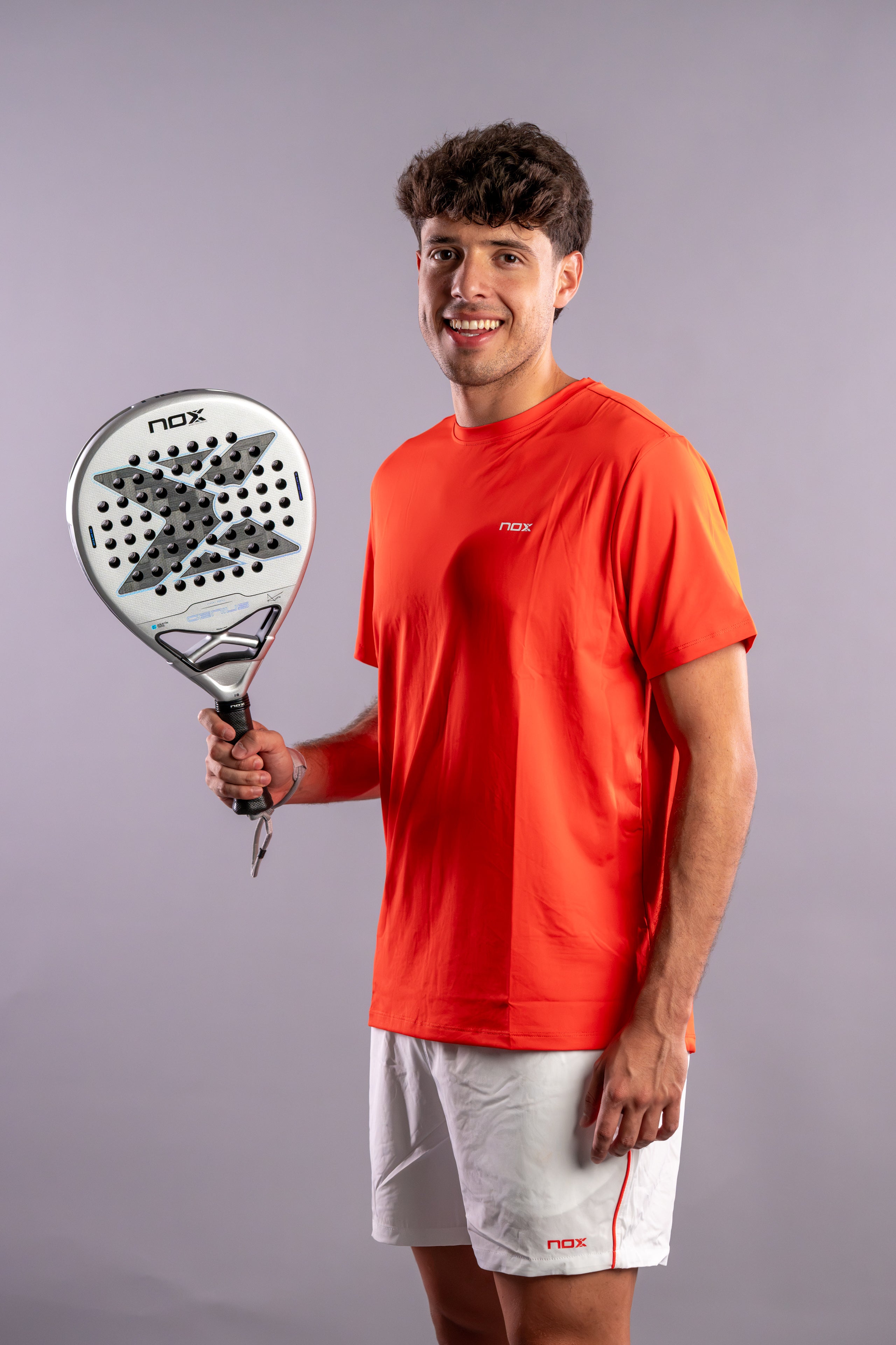 Tapia holding the NOX Genius 12k Alum Xtrem (2027) padel racket by Agustín Tapia available in New Zealand from ThePadelShopNZ