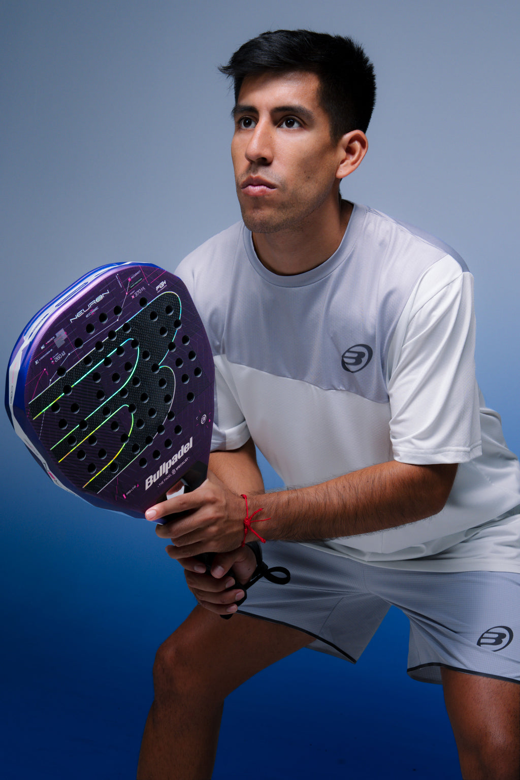 Fede Chingotto holding the Bullpadel Neuron 02 Edge (2027) padel racket available in New Zealand from ThePadelShop.co.nz