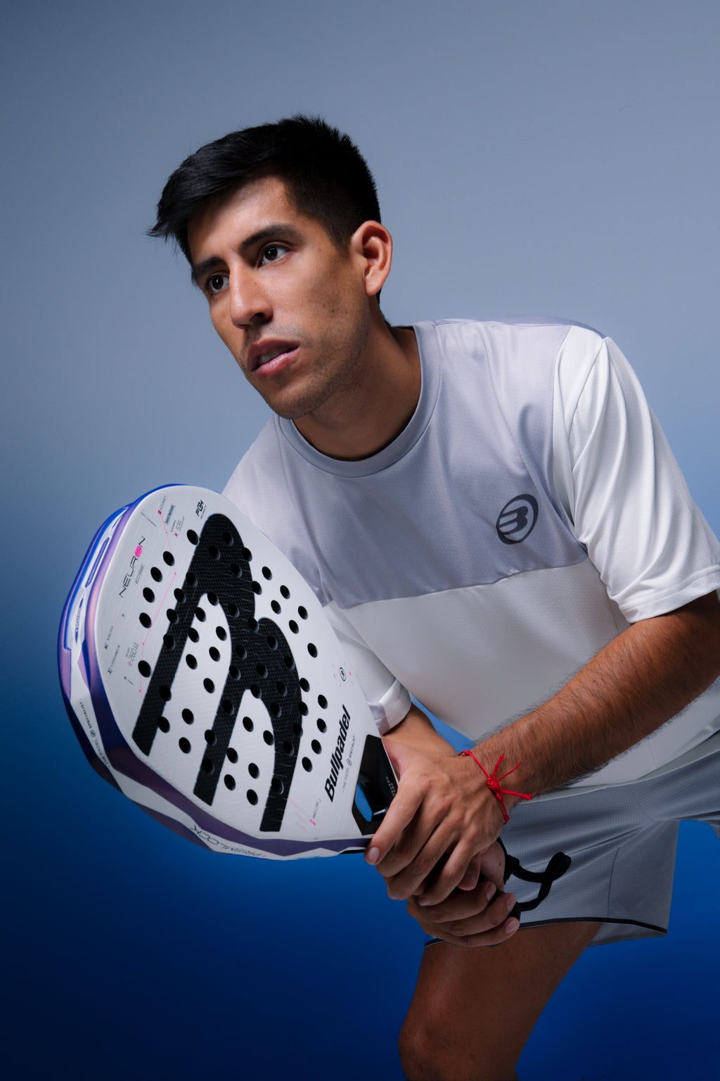 Fede Chingotto holding the Bullpadel Neuron 02 Edge (2027) padel racket available in New Zealand from ThePadelShop.co.nz
