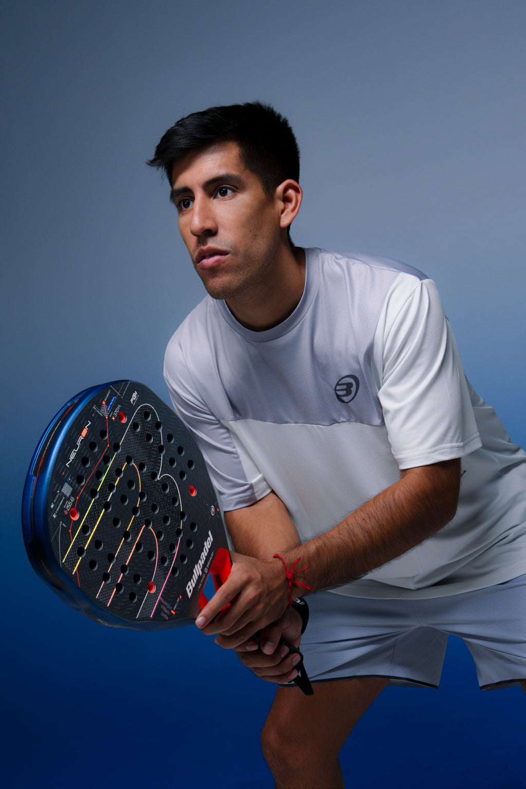 Fede Chingotto holding the Bullpadel Neuron 02 Edge (2027) padel racket available in New Zealand from ThePadelShop.co.nz