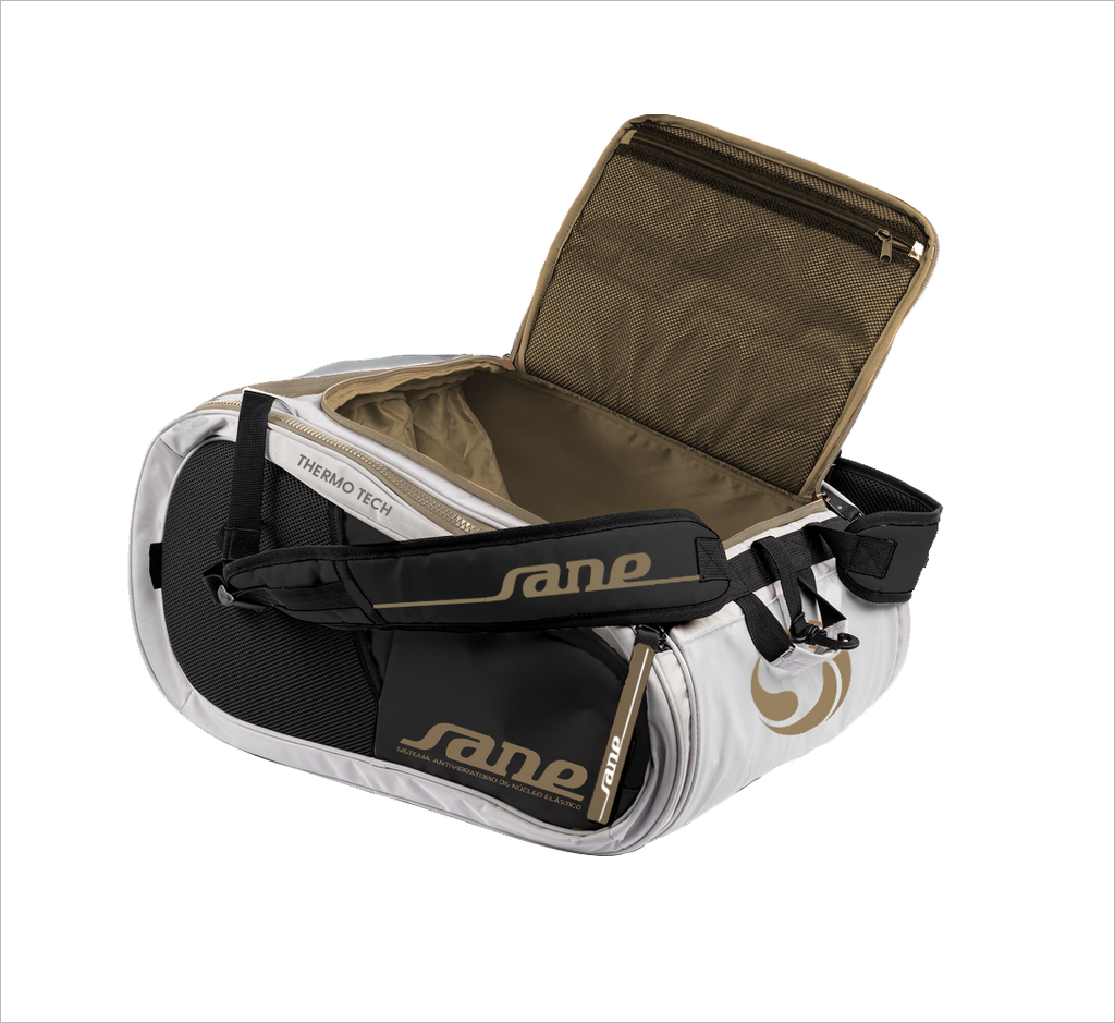 Open bag image of the White and  Black SANE Pro Elegance padel racket bag available in New Zealand from ThePadelShop.co.nz 