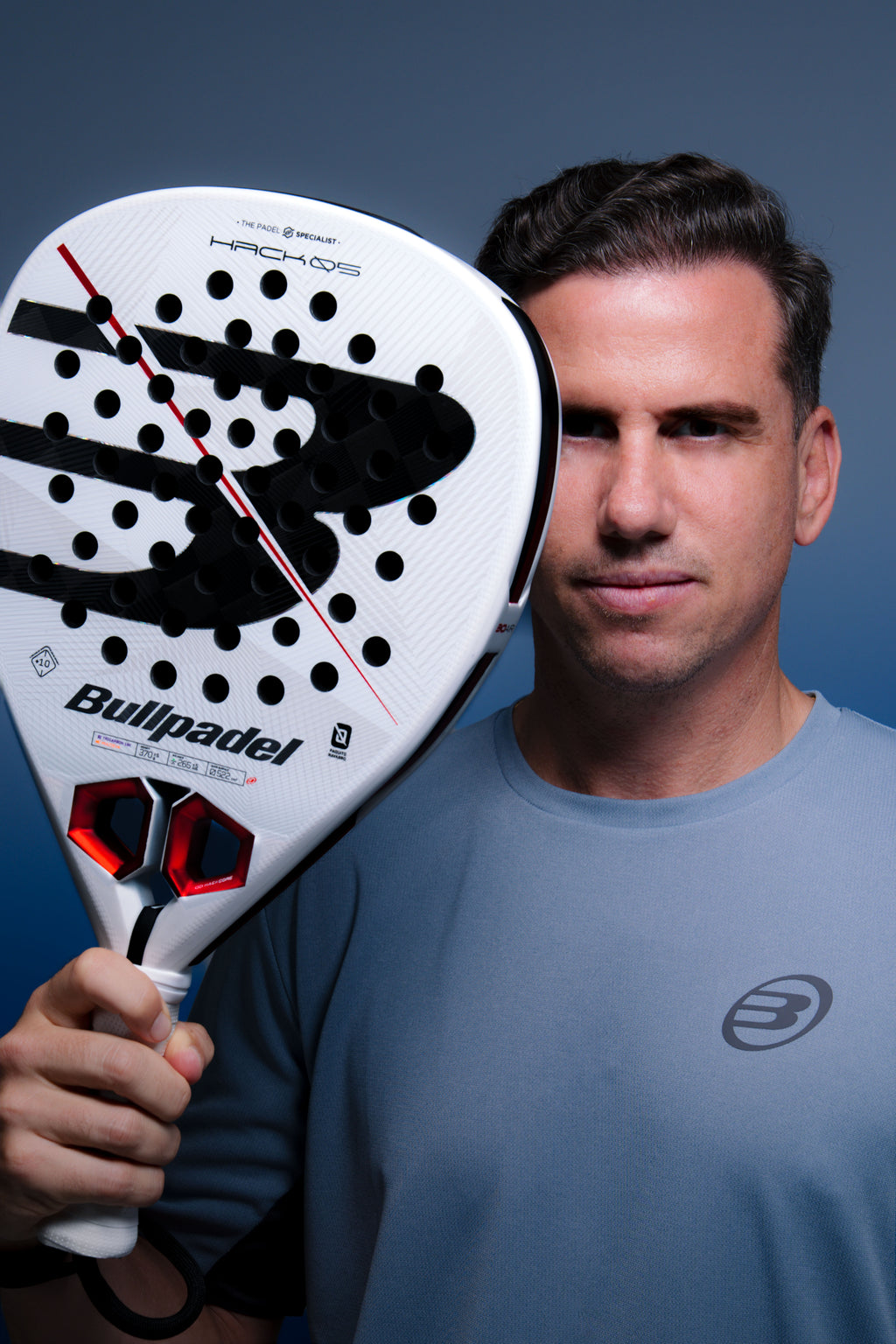 Paquito Navarro holding the Bullpadel Hack 05 (2027) padel racket available in New Zealand from ThePadelShopNZ