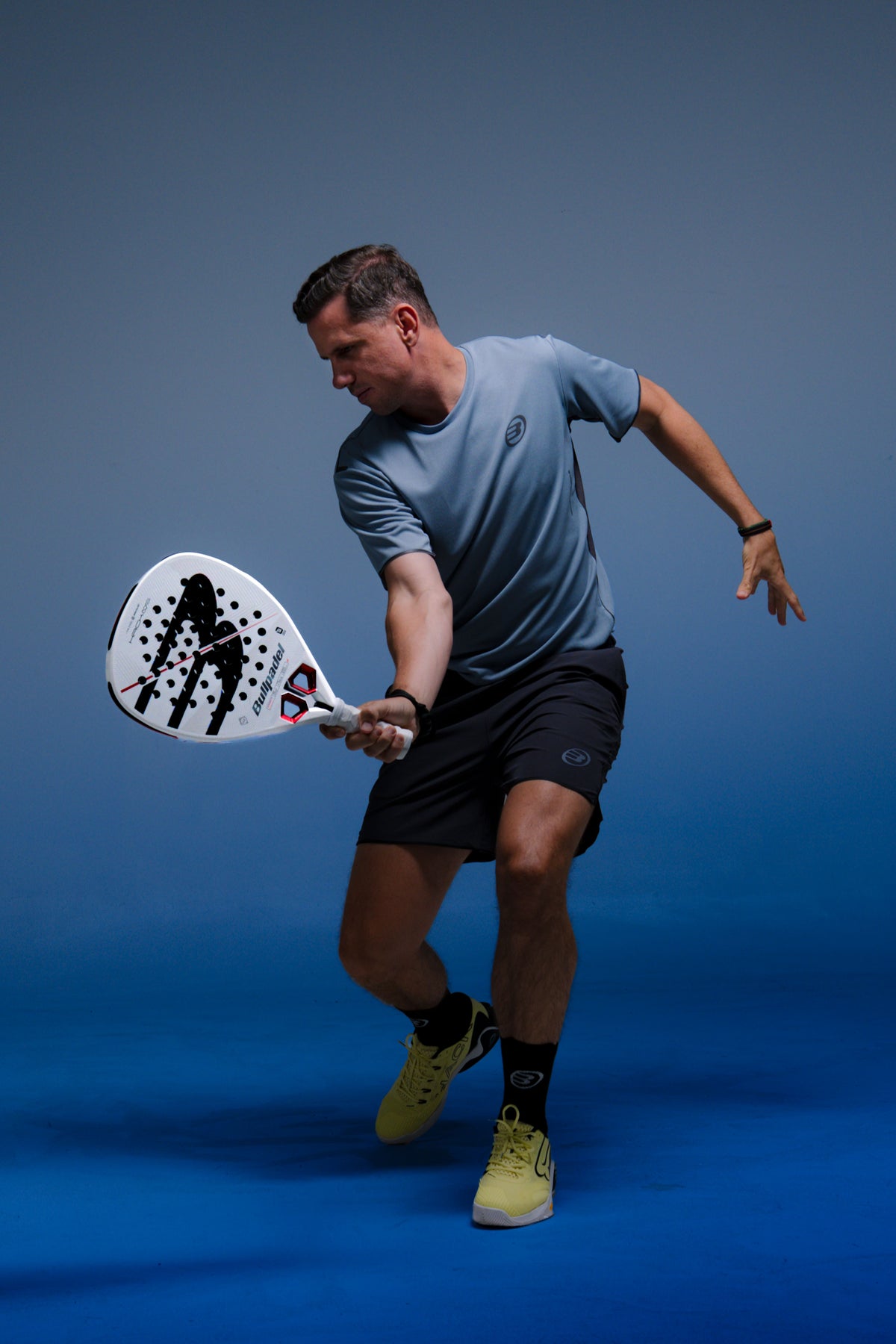 Paquito Navarro holding the Bullpadel Hack 05 (2027) padel racket available in New Zealand from ThePadelShopNZ