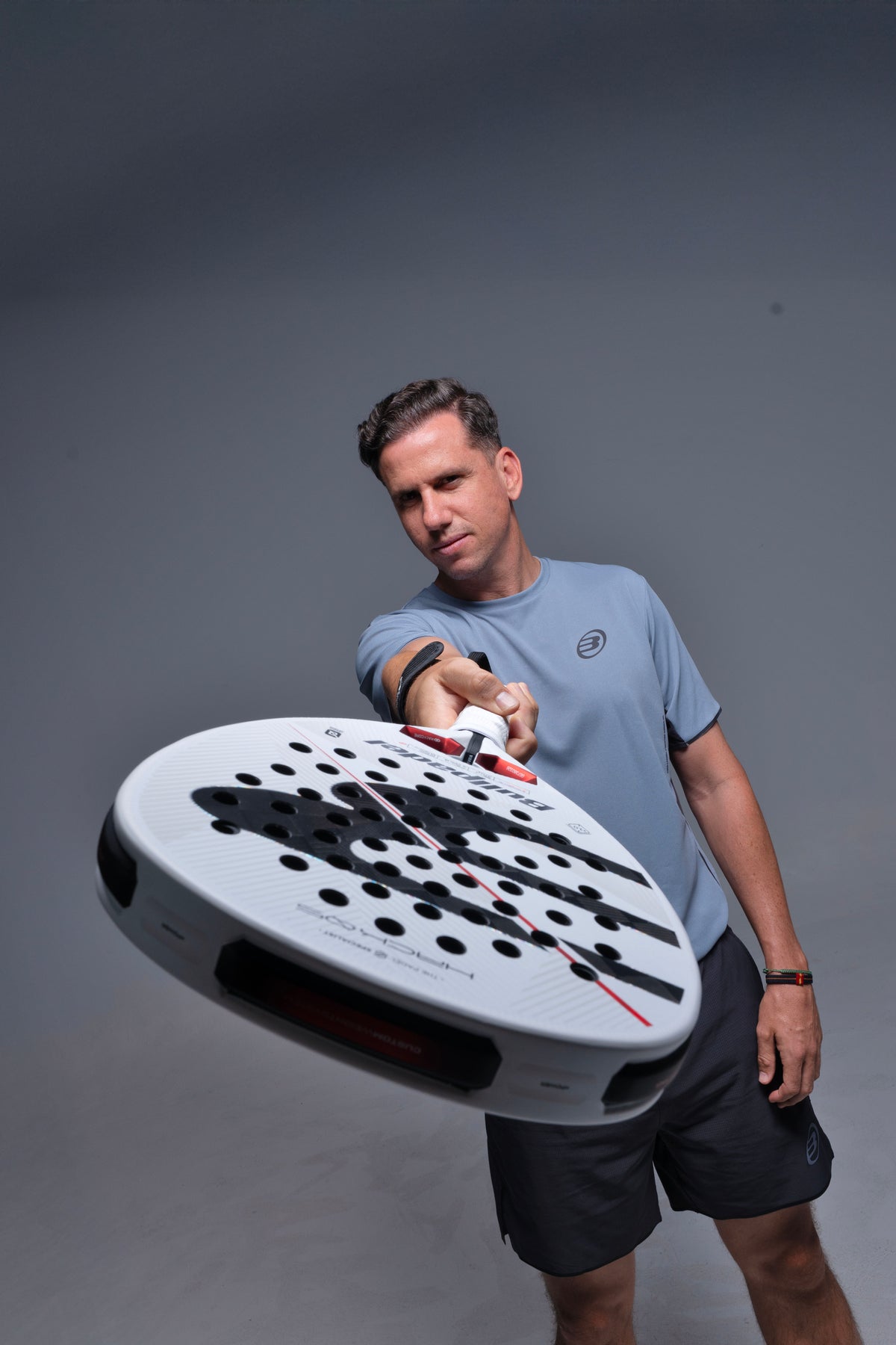 Paquito Navarro holding the Bullpadel Hack 05 (2027) padel racket available in New Zealand from ThePadelShopNZ